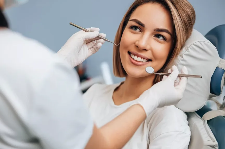Patient smiling during a dental visit